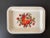 A beautiful floral and ivory rectangular toleware tray for entertaining, USA, circa mid 20th century. A Victorian bouquet...