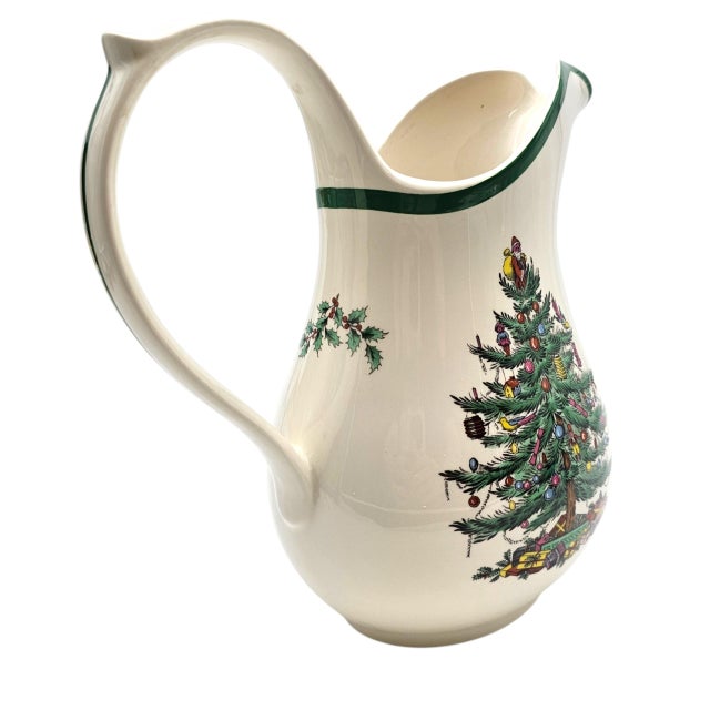 This vintage Spode Christmas Tree water pitcher features the company’s signature holiday pattern introduced in 1938. The...
