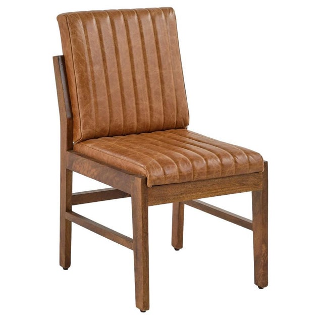 The Vance Leather Armless Dining Chair arrives as a set of two, combining genuine leather upholstery with engineered frame...