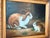 20th century oil painting on canvas by an artist named Borofsky. The painting depicts a single brown and white rabbit...