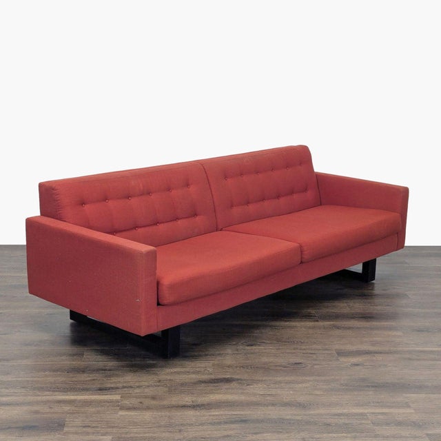 This Room and Board 3-seat sofa features a modern, clean-lined design in a bold red fabric. The tufted back and seat...