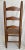 Wood Antique Child's Ladder-Back Chair With Cane Seat - Early 20th Century For Sale - Image 7 of 12
