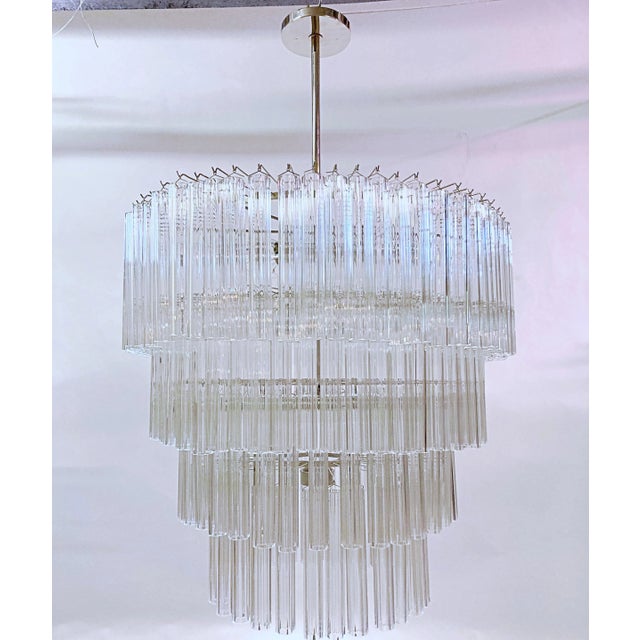 This is a custom made chandelier by LMD Custom Lighting Nickel polished finish and vintage Venini Tronchi glass tubes. It...