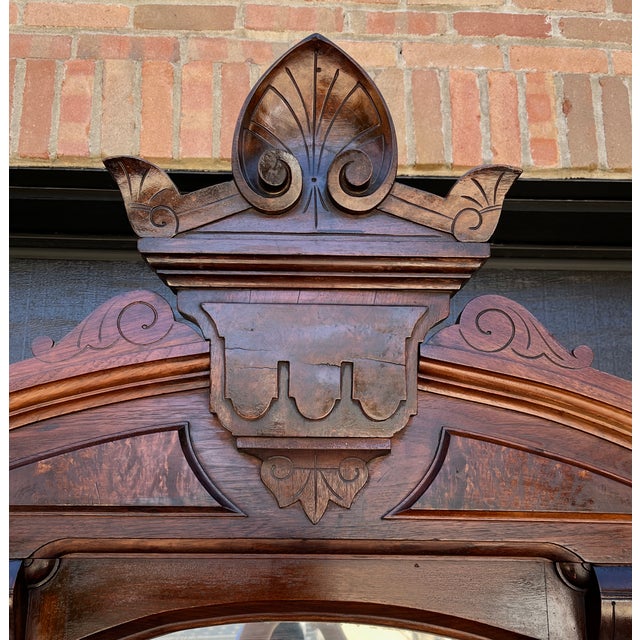 Beautiful carvings on this monumental dresser evoke the Art Deco period perfectly. Circa late 19th century, this beauty...