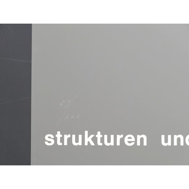 Strukturen und Prinzipien is a vintage poster realized by Almir da Silva Mavignier (Rio de Janeiro, 1925-2018) in 1979....