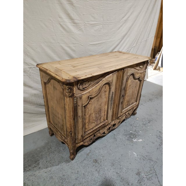 A beautiful 18th century French Provincial buffet from the Provence region, likely Avignon, dating to circa 1780. Crafted...