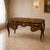 Make a statement with this magnificent French Rococo-style executive desk, crafted in rich wood and decorated with...