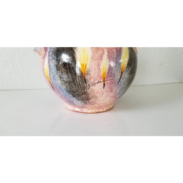 offered for sale is an artistic Vintage handmade and painted decorative pottery Vase. Featuring hand painted artistic...
