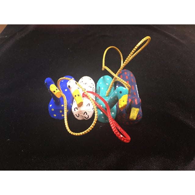 2000s Signed L. Herb New Mexican Handcarved & Painted Geese Christmas Ornaments- Set of 4 For Sale - Image 4 of 5