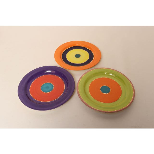 Contemporary glazed ceramic decorative plates (2004, USA). Concentric circle pattern with bold, vibrant glazes, and hand...