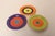 Contemporary glazed ceramic decorative plates (2004, USA). Concentric circle pattern with bold, vibrant glazes, and hand...