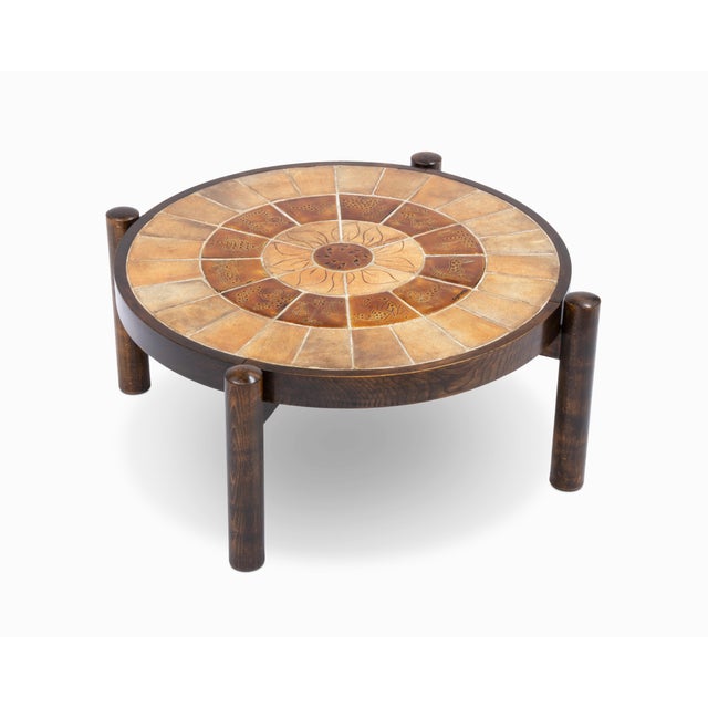 Here is an amazing French tile table with a zodiac motif, signed by Roger Capron. It is in excellent original condition...