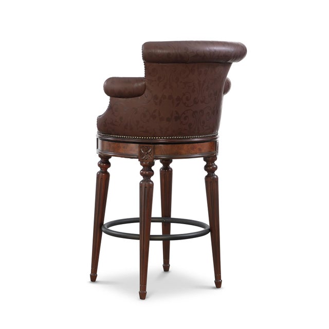 Aged Regency finished mahogany swivel barstool. Venetian Regal Alabama Coco leather upholstery