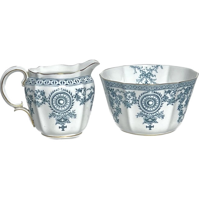 A late Victorian, blue and white fine porcelain cereal bowl and milk jug set, in a rare neoclassical pattern, enriched...