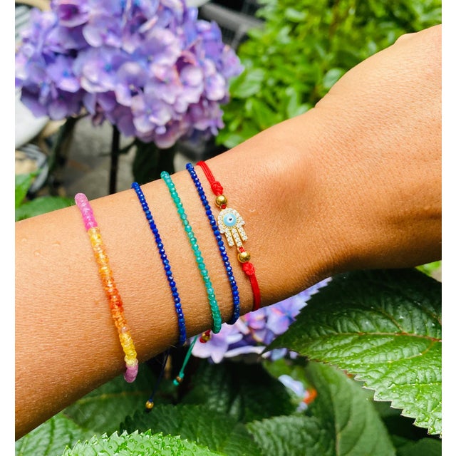 This is part of Chairish’s Fine Jewelry assortment. Atelier All Day Signature Collection Red String Bracelet with cubic...