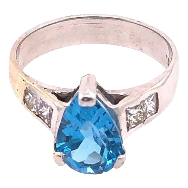 18 Karat White Gold Blue Topaz Center With Diamond Accents Ring 0.72 TDW, Size 6.5 For Sale