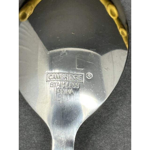 Add a touch of natural style to your table with this Cambridge Bamboo Look Stainless Steel Flatware Set. Designed with...