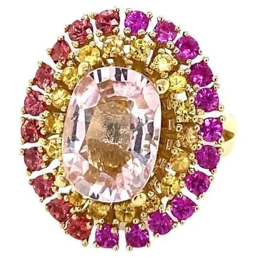 6.32 Carat Natural Pink Morganite Sapphire Rose Gold Cocktail Ring This ring has a 4.07 Carat Oval Cut Pink Morganite and...