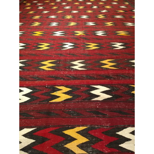 Few vintage Moroccan kilims survive at this scale, making this oversized mid-20th century example a genuinely rare find....