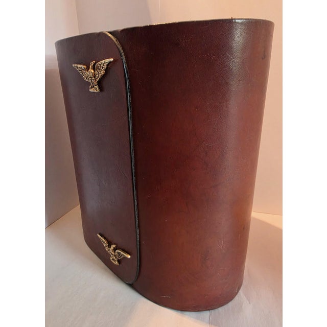 This wastebasket is a rustic yet elegant accent that is unusually classic for a utilitarian everyday object. The cinnamon...