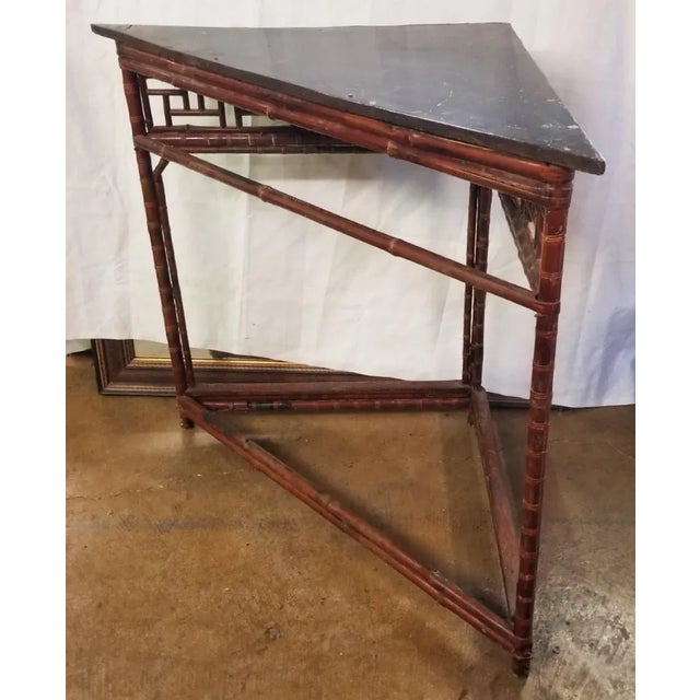 A great Asian table with lots of arranged bamboo details and an unique height. The longest side measures 40.5" end to end,...