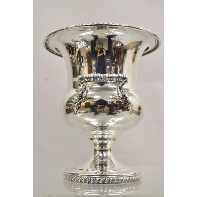 Vintage WM Rogers Silver Plated Twin Handle Trophy Cup Champagne Chiller Ice Bucet. Circa Mid 20th Century. Measurements:...
