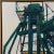 1990s Vintage Industrial Landscape With Green Refinery Detail, Signed (1999, Oil on Canvas) For Sale - Image 5 of 8
