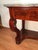 This elegant French Restoration console table, crafted between 1820 and 1830, reflects the refined transition toward the...