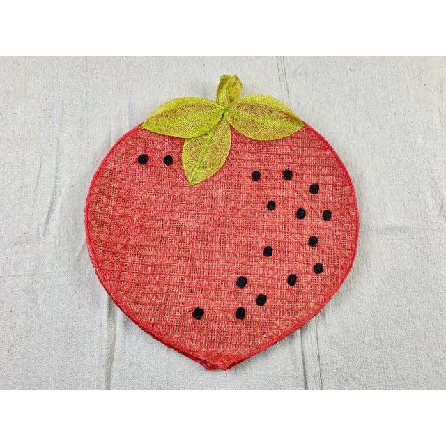 Fun vintage placemats. Set of 4. Made of raffia and look like strawberries. Look to have never been used. Perfect for...