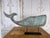 Exceptional late 19th-century American Folk Art copper whale weathervane, mounted on modern iron display base. This is a...
