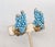 Rare 1950s goldtone hand wired two "stacks" of faux-turquoise beads with channel set round clear rhinestones around the...