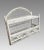 Attractive and very useful mounted wall shelf or organiser in a crisp white paint finish, in the style of Heywood...
