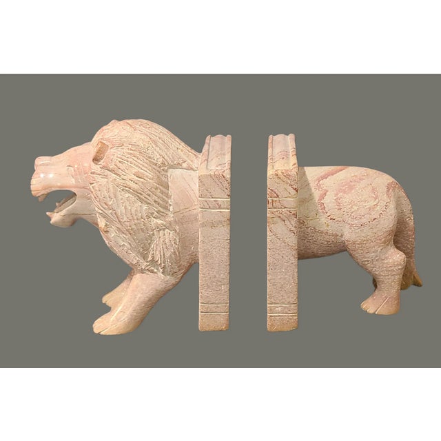 These Hand Carved Italian Marble Lion Bookends are a unique and elegant addition to any home décor. Made from pink marble...