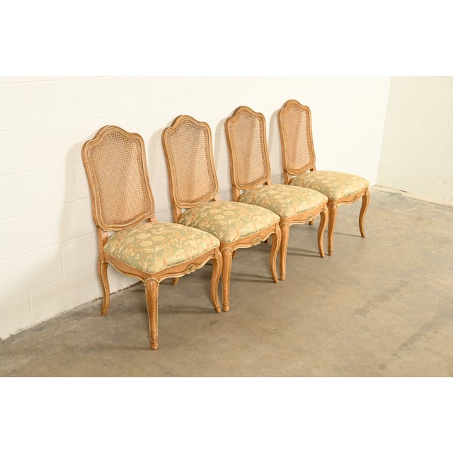 A gorgeous set of four French Provincial Louis XV style side chairs or dining chairs By John Stuart USA, Circa 1960s...
