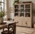 Handcrafted from solid wood, this expansive three-door glass hutch brings timeless architectural character and versatile...