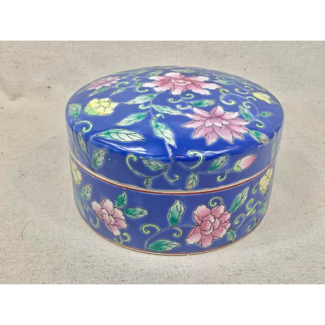 Large vintage chinoiserie lidded box. Bright blue color with floral design. Ceramic. Perfect for display or to use with...
