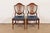 A gorgeous pair of Federal or Hepplewhite style shield back side chairs or dining chairs In the manner of Baker Furniture...