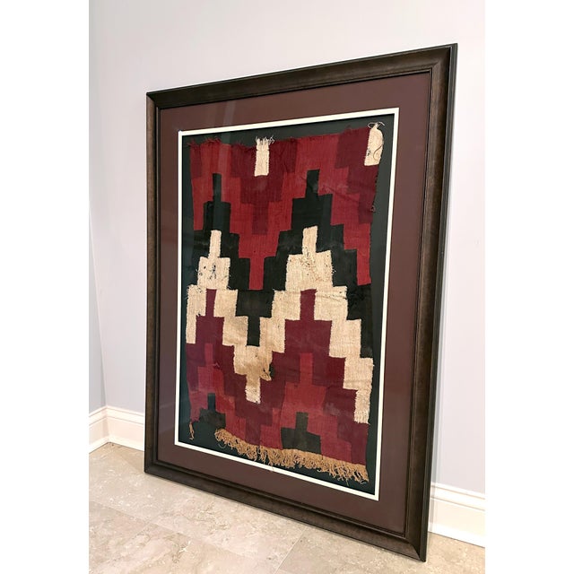 An antique textile panel from Nazca culture on the south coast of nowadays Peru circa 600 to 800AD. The panel with short...