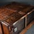 This is a gorgeous antique Chinese small cabinet crafted from solid Huali (Rosewood) wood. The most striking feature of...