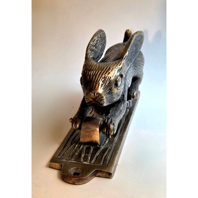 Bring a touch of woodland charm to your entryway or tabletop with this wonderfully detailed brass rabbit door knocker,...