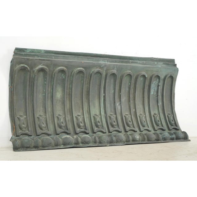Reclaimed 100 year old architectural copper cornice piece newly altered as wall art. It was handcrafted into a mirror in...