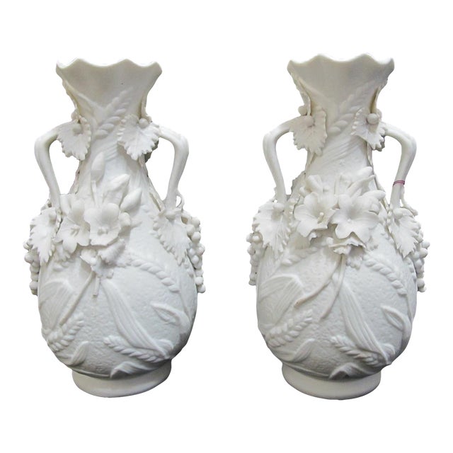 White Parian Bisque Porcelain Raised Wheat & Grape Pattern Handled Vase Pair For Sale