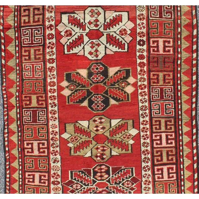 Red background antique Kazak runner with seven medallions and tribal design, rug g-1204, country of origin / type:...