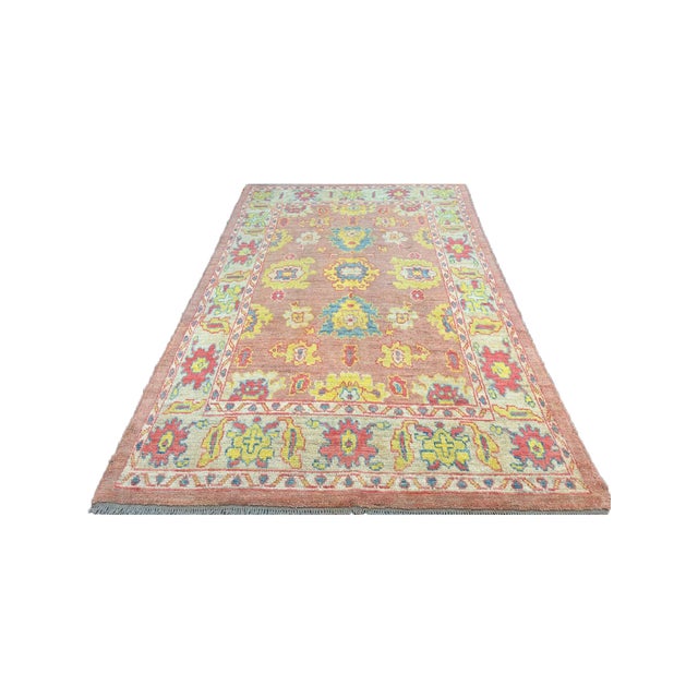 Exact Size: 6'6" x 9'4" Color: Pink Age: New Materials: Wool Construction: Hand Knotted Origin: Iran