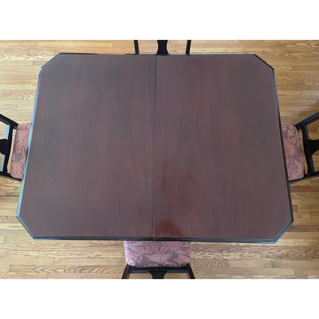 This beautifully restored and upholstered Jacobean dining set dates back to the 1920s. It is likely made of walnut or oak...