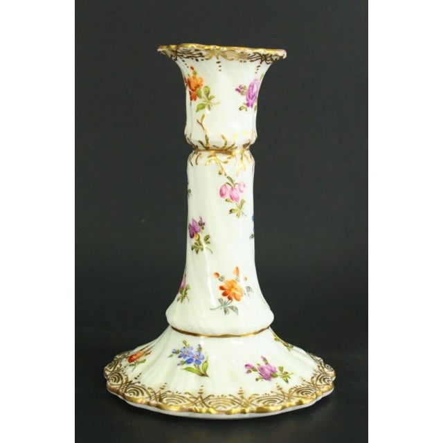 A beautiful antique candle holder, made of the finest porcelain All hand painted and decorated with floral sprays and...