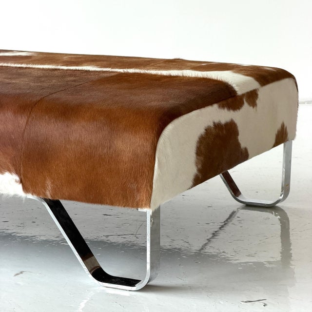 c. 2008. Italy. Reupholstered in brown cowhide. Chrome legs.
