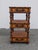 Elevate your living space with this exquisite vintage multi-tier wicker and rattan étagère stand by master furniture maker...