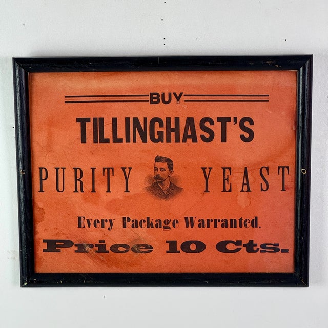 A framed Tillinghast's Purity Yeast antique advertising sign, that was produced on paper. The fiery orange brings a...