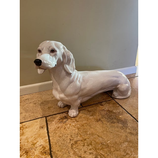 Stunning life sized midcentury modern Dachshund statue hand made from terra cotta with great attention to detail. The...